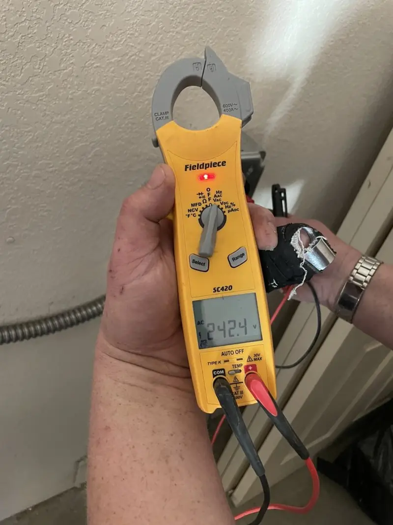 Voltage testing with clamp meter during Outlet Installation in Aptos